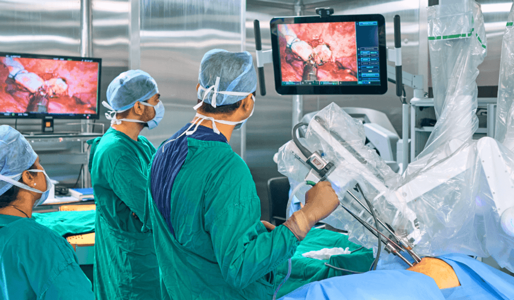 An image of three doctors in an operating theatre