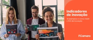 Equipe de trabalho reunida vendo indicadores de inovação