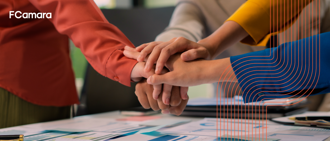 Equipe reunida durante desenvolvimento de POC