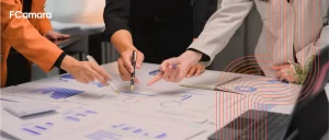 Profissionais analisando dados para retratar diferença entre BI e analytics